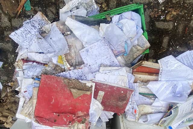 Some of the discarded documentation which local residents are worried "could fall into the wrong hands".

 Picture by FRANK REID