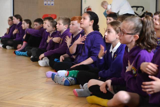New Penshaw Academy children using makaton sign language to help relay the song A Thousand Years.