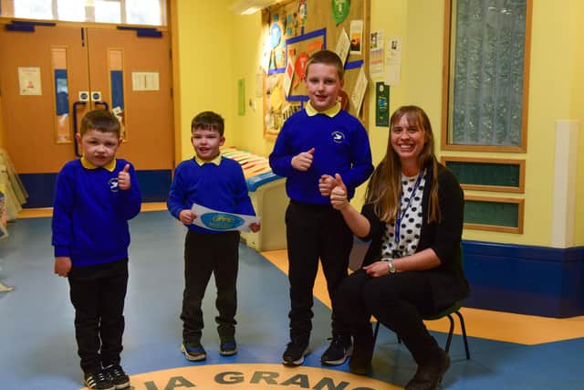 Teacher Michelle Wardropper alongside Class 1 and Class 10 pupils practising their Makaton at Columbia Grange School.
