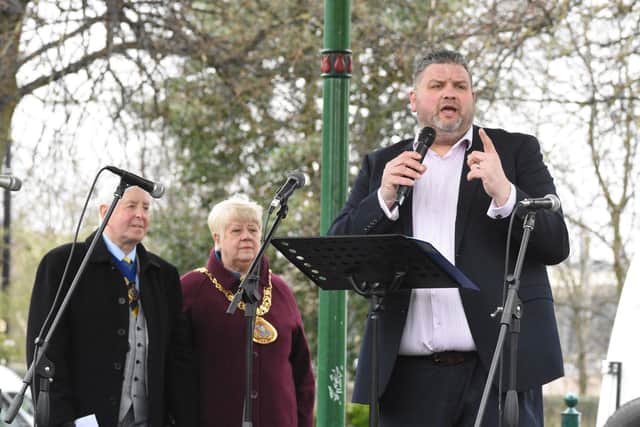 Rev Nathan Weaver from New Springs City Church addresses the crowd, watched by the Mayor Cllr Alison Smith and consort David Smith.