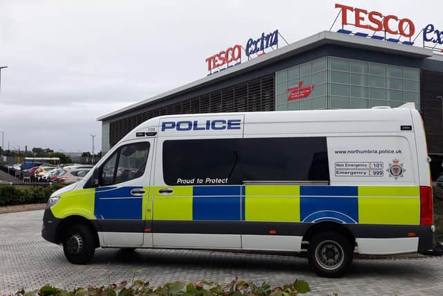 Police were called to Tesco Extra after a man was attacked by a teenage gang.