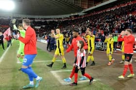 Eliza Atkinson was one of our recent mascot winners and she got to lead the lads out with her hero Jermain Defoe