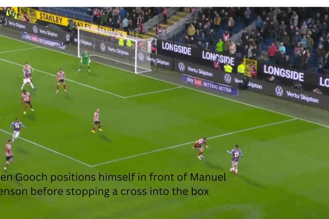 Lynden Gooch positions himself in front of Manuel Benson before stopping a cross into Sunderland's box.