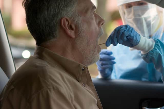 A man takes a coronavirus test.