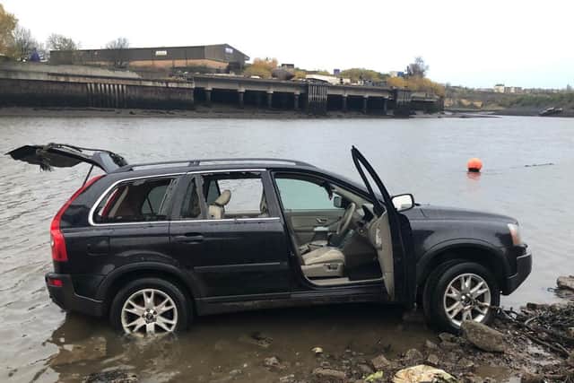 A photo shared by Northumbria Police as its officers recovered the car from the water.