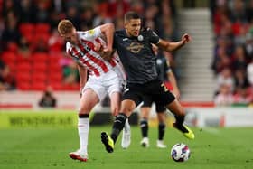 Defender Nathan Wood playing for Swansea City against Stoke. (Photo by Lewis Storey/Getty Images)
