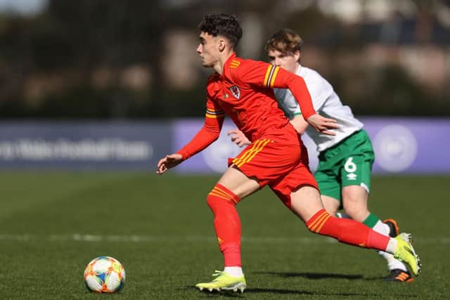 Niall Huggins playing for Wales Under-21s.