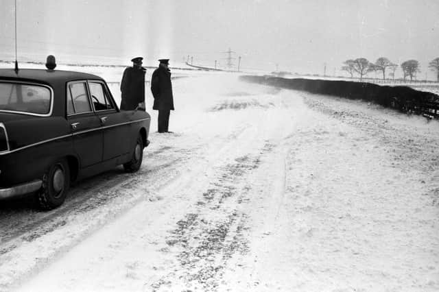 Sunderland's mobile police officers check road conditions near Offerton road ends on the Sunderland Penshaw road in February 1963.