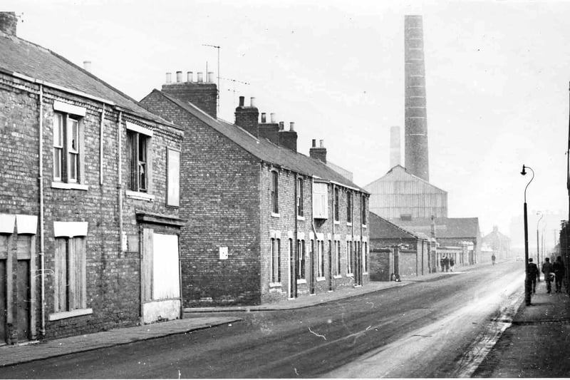 The Paper Mill which closed in 1965 and the chimney which was demolished in 1971.