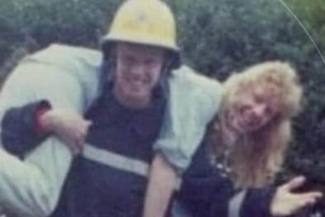 Tony Chapman when he joined the fire service 30 years ago. He is pictured lifting older brother David.