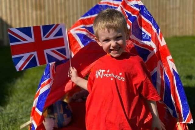 Sam Weightman with his Union Jack tent as he gets ready for the Coronation celebrations.