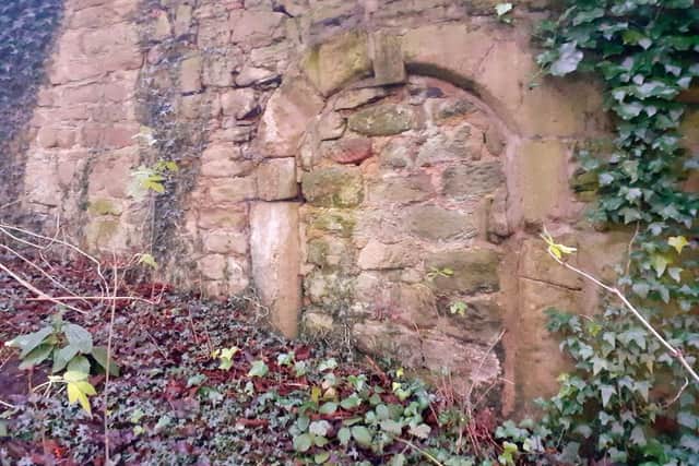 The ancient doorway was crudely bricked up in the late 1940s.