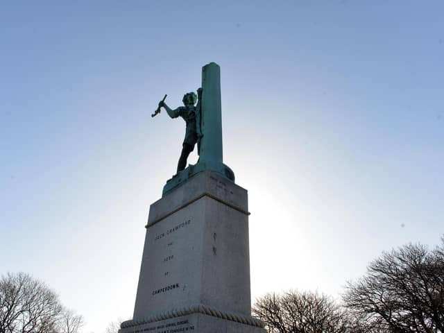 The statue in Mowbray Park shows Jack Crawford nailing the colours of HMS Venerable to its mast.