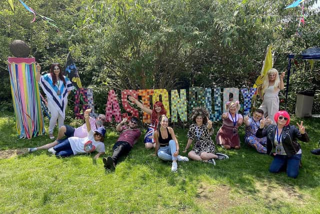 Staff and service users from Education and Services for People with Autism dressed up for their own Glastonbury Festival.