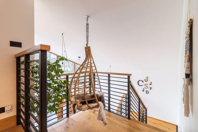A hanging chair on the first-floor landing.