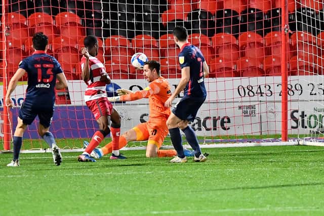 Fejiri Okenabirhie rescues a point for Doncaster Rovers