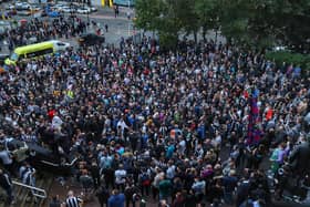 Jubilant Newcastle United fans gather outside St James's Park. North News.