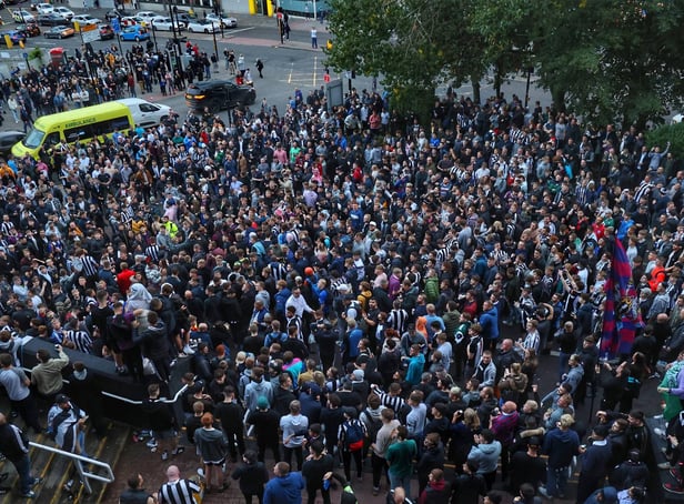Jubilant Newcastle United fans gather outside St James's Park. North News.