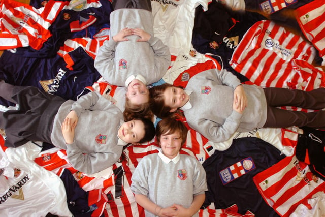 Year 4 pupils were collecting old football shirts at Barnes Juniors in 2008 to send them to Uganda. Pictured are Rob Slade, Tiffany Eadie, Freya Rayner and Jade Reed.