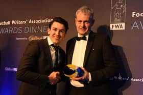 Luke O'Nien receives his award from Mark Robson. Picture by The Sir Bobby Robson Foundation.