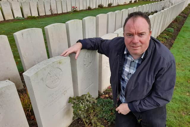 Private Lawrence Gillan's grave, where he has lain since 1915, receives a first ever visitor; great-nephew and Echo reporter Tony Gillan. Picture by Bethan Gillan.