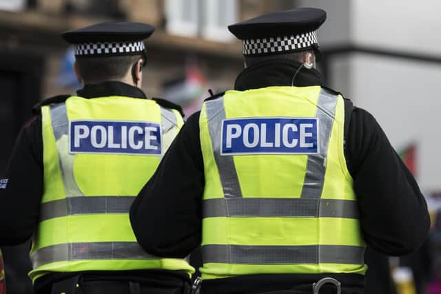 A man has been charged after police officers discovered weapons and balaclavas in a car.