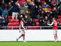 BRISTOL, ENGLAND - JANUARY 08: Antoine Semenyo (L) of Bristol City celebrates with teammate Mark Sykes after scoring the team's first goal during the Emirates FA Cup Third Round match between Bristol City and Swansea City at Ashton Gate on January 08, 2023 in Bristol, England. (Photo by Dan Istitene/Getty Images)