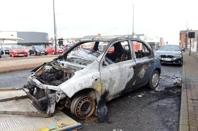 One of the cars which was set alight by Sherrington