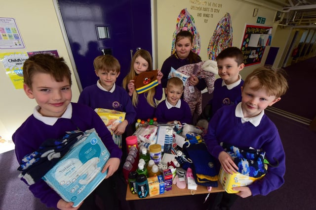 Members of the 'Rights Knights' at Hastings Hill Academy with the first of the items they collected for Ukraine in March last year.