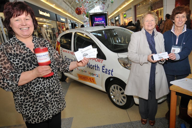 Grace House fund-raisers Karen McLennan, Joan Wilkes and Anne McSweeney were pictured alongside the car that was being raffled to raise funds for a children's hospice in 2013.