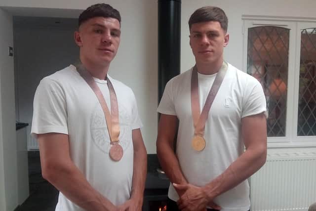 Luke (left) and Pat McCormack with their 2018 Commonwealth Gas medals