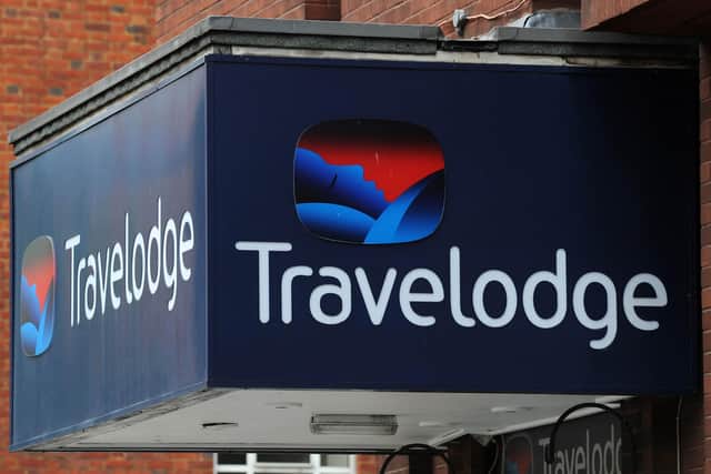 File photo dated 08/12/2021 of a Travelodge sign where staff at the 582 hotels reported a significant increase in holiday items being left behind during the last year. Issue date: Monday January 10, 2022. 
PA Photo. A dog called Beyonce, a drum kit, a 1940s typewriter and a suitcase full of Blackpool rock were among the items left behind by people who stayed at Travelodge hotels last year. See PA story INDUSTRY Travelodge. Photo credit should read: Nick Ansell/PA Wire 