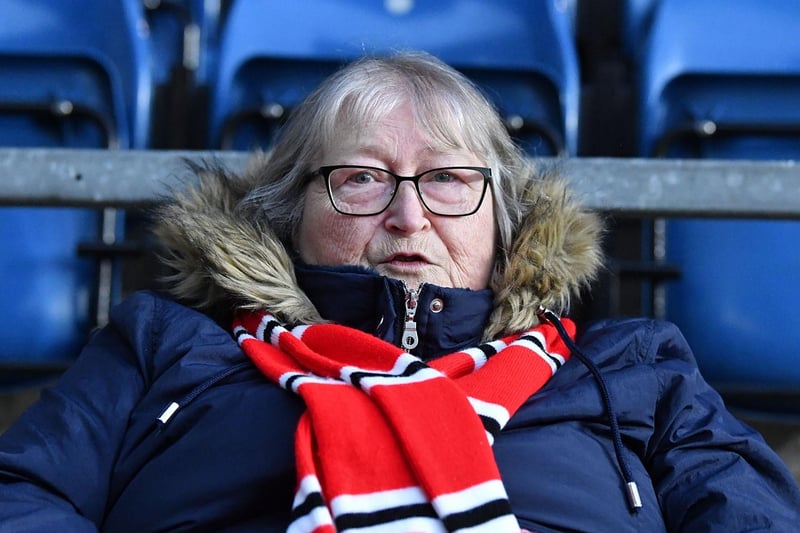 This Sunderland fan used a scarf to keep warm on a cold night at Turf Moor.