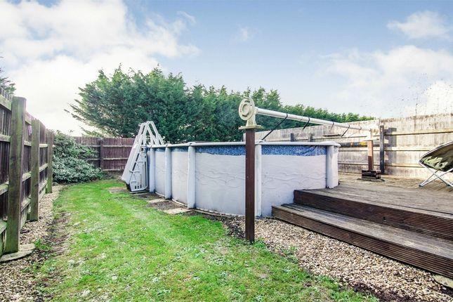 The property also features an outdoor heated swimming pool