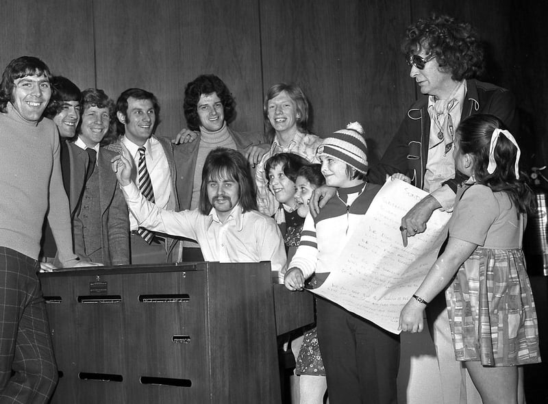 Players left Roker Park to record ''Sunderland All Of The Way'' at a Manchester studio.  Some of the players are pictured above rehearsing with comedian Bobby Knoxall and youngsters who provided the chorus.