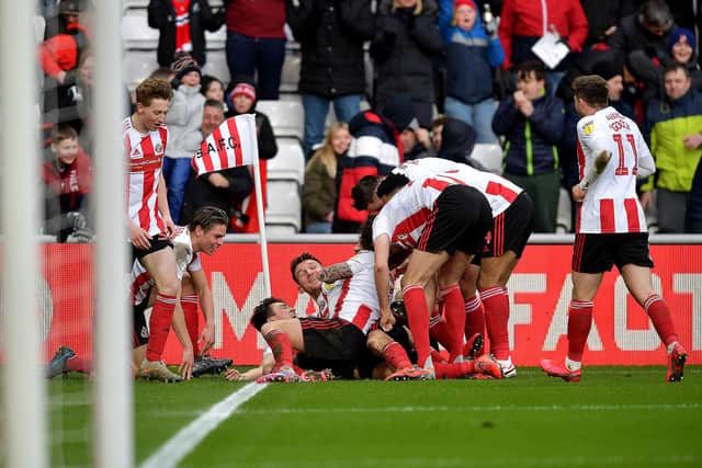 The Sunderland players celebrate the win against Bristol Rovers.