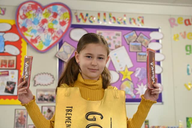 Cassie Holden, nine, was dressed as the golden ticket from Willy Wonka and the Chocolate Factory.