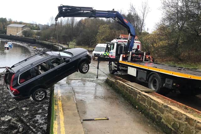 This photo from Northumbria Police shows the car as it was lifted out of the River Wear.