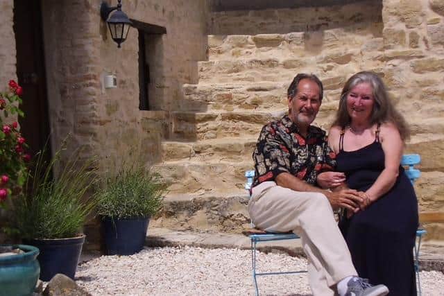 Sandra and husband Greg outside their Italian home.