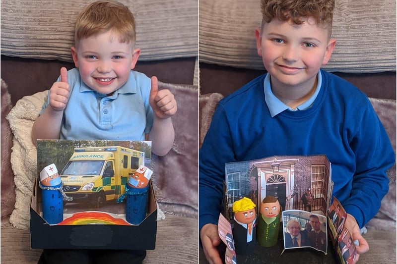 Noah, age 4, says thanks to the NHS with his painted eggs while Travis, age 8, recreated a picture of Prime Minister Boris Johnson and his own dad.