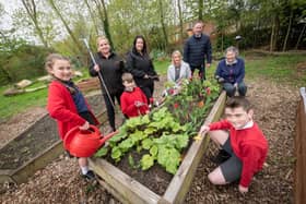 Children from Rickleton Primary School with, from left, Gentoo colleagues Kim Burnikell and Sheryl Robinson, the school's headteacher Jan Price, deputy headteacher Alan Baker and Rickleton Community Garden volunteer Anita Bargewell.