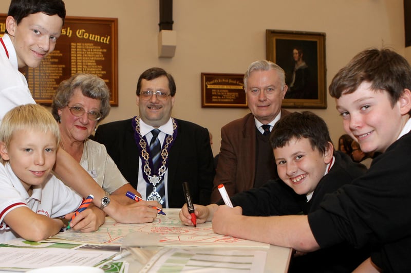 Schools democracy workshops - deputy mayor Stewart Young  and fellow councillors Ann Young and John Pritchard help the team from Chapel High School draft their manifesto.