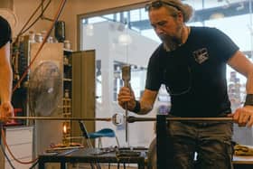 James Maskrey, master glassmaker at National Glass Centre, pictured working on Katie Paterson’s commission.
