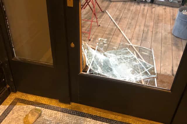 Thieves used bricks to gain entry to the deli.