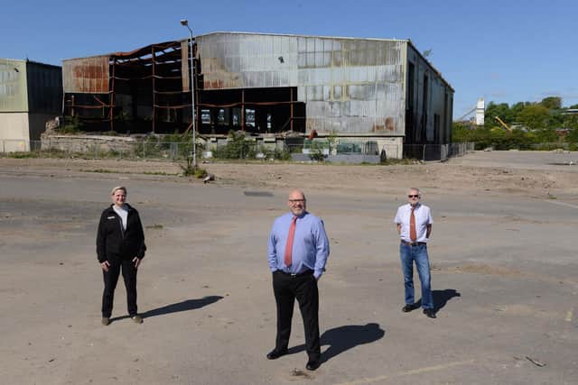 The abandoned Alex Smiles waste site in Deptford, Sunderland, where 20,000 tonnes of waste has been removed ahead of its transformation into a manufacturing site for crane maker Liebherr.. 
L-R: Lauren Hill Acumen Waste Services, Sunderland Council Leader Graeme Miller, Ralph Saelzer Liebherr MD.