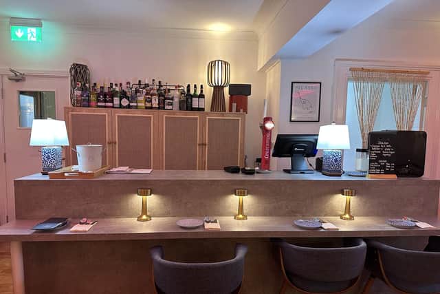 The bar area with its own seating, ideal if you're a solo diner