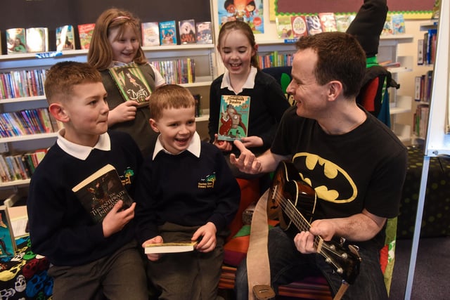 Childrens author Gareth P Jones with Year 3 pupils from Thorney Close Primary School. Pictured left to right in 2016 were Alex Reay, Leah Wright, William Elliott and Naomi Cunningham.