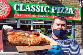 Classic Pizza owner Selim Kilic with "The Best Kebab Calzone".