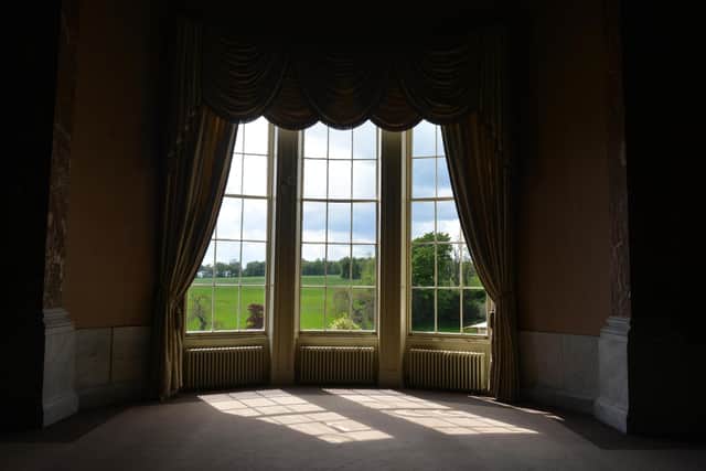 The main hall is surrounded by 120 acres of land on the estate