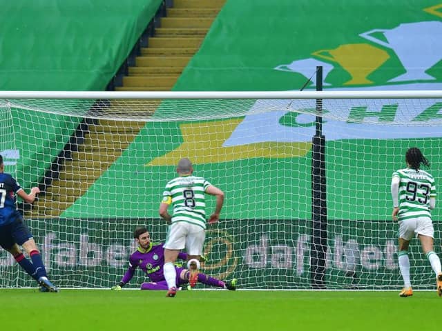 Ross Stewart of Ross County scores a penalty against Celtic.